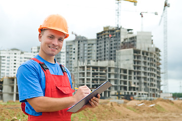 Image showing smiling Builder inspector at construction area