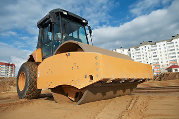 Image showing soil vibration compactor at work