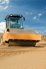 Image showing Earth vibration compactor at work