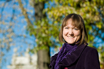 Image showing Portrait of cheerful student outdoors