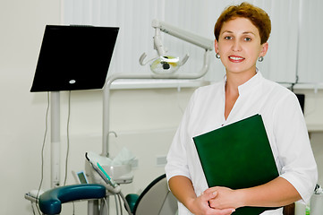 Image showing Cheerful dentist at clinic