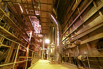 Image showing Equipment, cables and piping as found inside of a modern industr