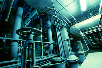 Image showing Equipment, cables and piping as found inside of a modern industr