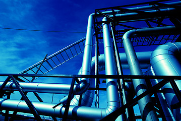 Image showing Industrial zone, Steel pipelines in blue tones  