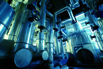 Image showing Industrial zone, Steel pipelines, valves and ladders in blue ton