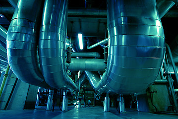 Image showing Equipment, cables and piping as found inside of a modern industr