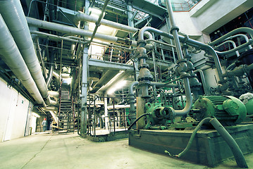 Image showing Equipment, cables and piping as found inside of a modern industr