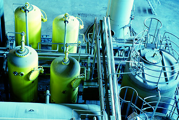 Image showing Equipment, cables and piping as found inside of a modern industr