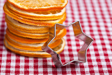 Image showing Orange and Cookie Cutter
