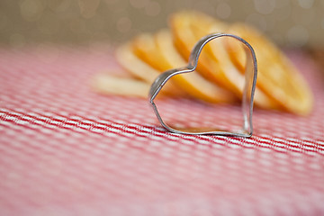 Image showing Orange and Cookie Cutter