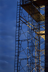 Image showing construction scaffolding against nighttime sky