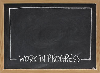 Image showing work in progress on blackboard