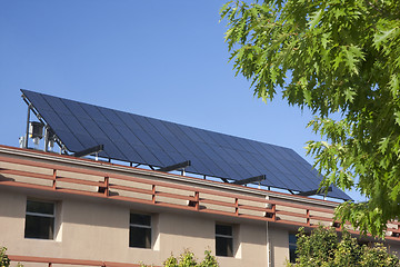 Image showing large solar panel on building roof