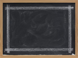Image showing blank blackboard with eraser smudges