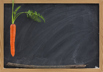 Image showing carrot, stick and blackboard - school motivation