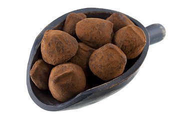 Image showing scoop of chocolate truffles