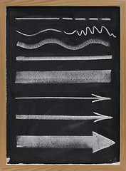 Image showing lines and arrows - white chalk on blackboard