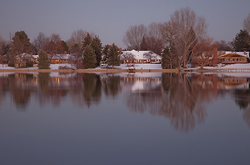 Image showing luxury houses on a lake shore at dusk