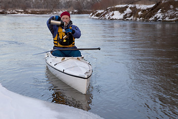 Image showing winter canoe - break for hot tea