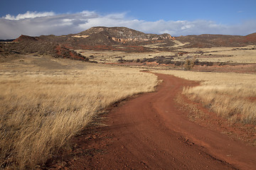 Image showing windy ranch road in mountain valley