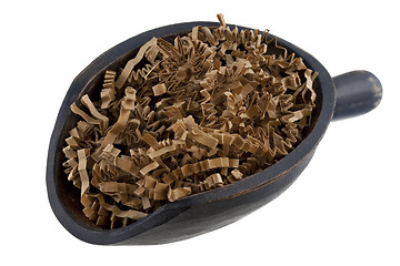 Image showing scoop of brown shredded paper, recycling concept