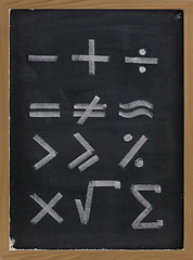 Image showing equation shapes - mathematical symbols on blackboard