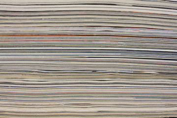 Image showing stack of colorful magazines - background