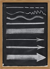 Image showing lines and arrows - white chalk on blackboard