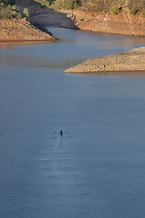 Image showing lonely rower on a mountain lake