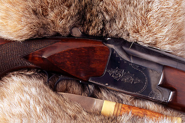 Image showing Hunting gun and a knife