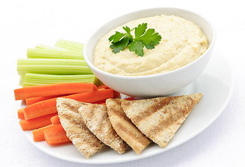 Image showing Hummus with pita bread and vegetables