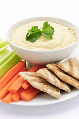 Image showing Hummus with pita bread and vegetables