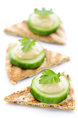 Image showing Appetizer of pita with hummus and cucumber