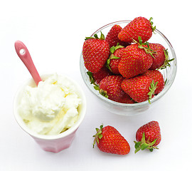 Image showing Bowl of strawberries with whipped cream