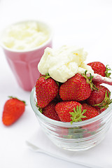 Image showing Bowl of strawberries with whipped cream