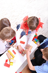 Image showing children playing with toy blocks