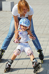 Image showing family rollerblading