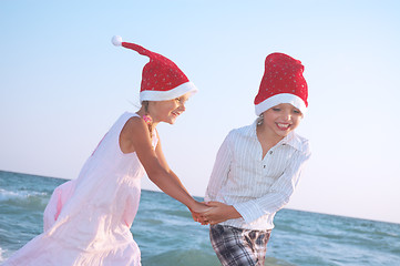 Image showing Santa children on the beach