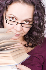 Image showing woman with stack of books