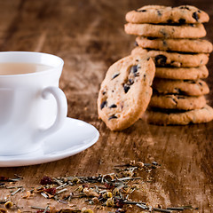 Image showing cup of herbal tea and some fresh cookies