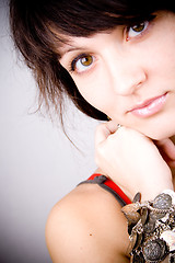 Image showing brunette lady with bracelets