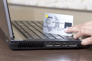 Image showing woman hands holding credit card, online shopping concep