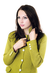 Image showing Pretty woman in yellow knitted jacket