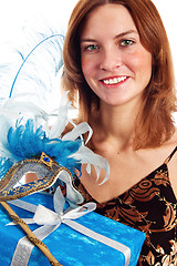 Image showing  Portrait of the young woman in a carnival to a mask, a close up