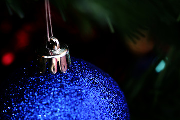 Image showing Christmas ornaments on tree.