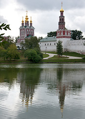 Image showing Novodevichy Convent reflects in the lake - portrait style.