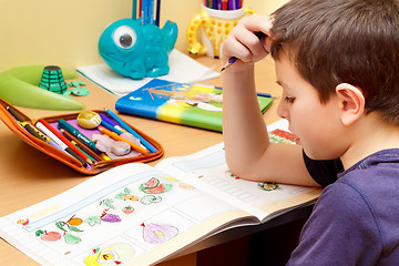 Image showing boy doing homework 