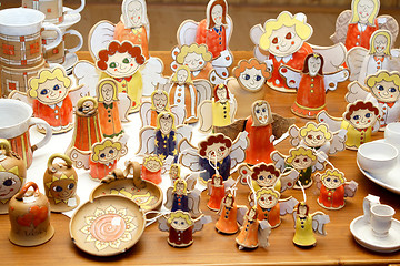 Image showing Hand-made ceramic Christmas decorations, angels and other figures