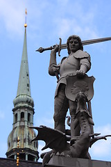 Image showing Statue of Saint George and tower of Dome Church in Riga