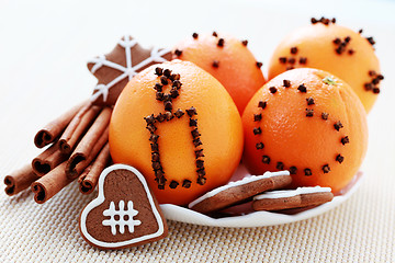 Image showing oranges and gingerbreads